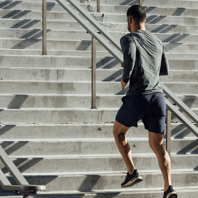 man running up the stairs